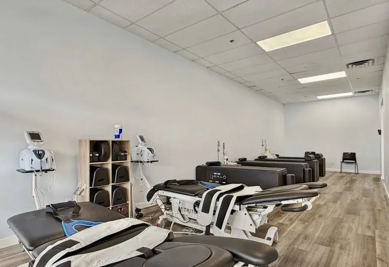 Decompression tables and therapy units set up in a treatment room at the Calhoun clinic.